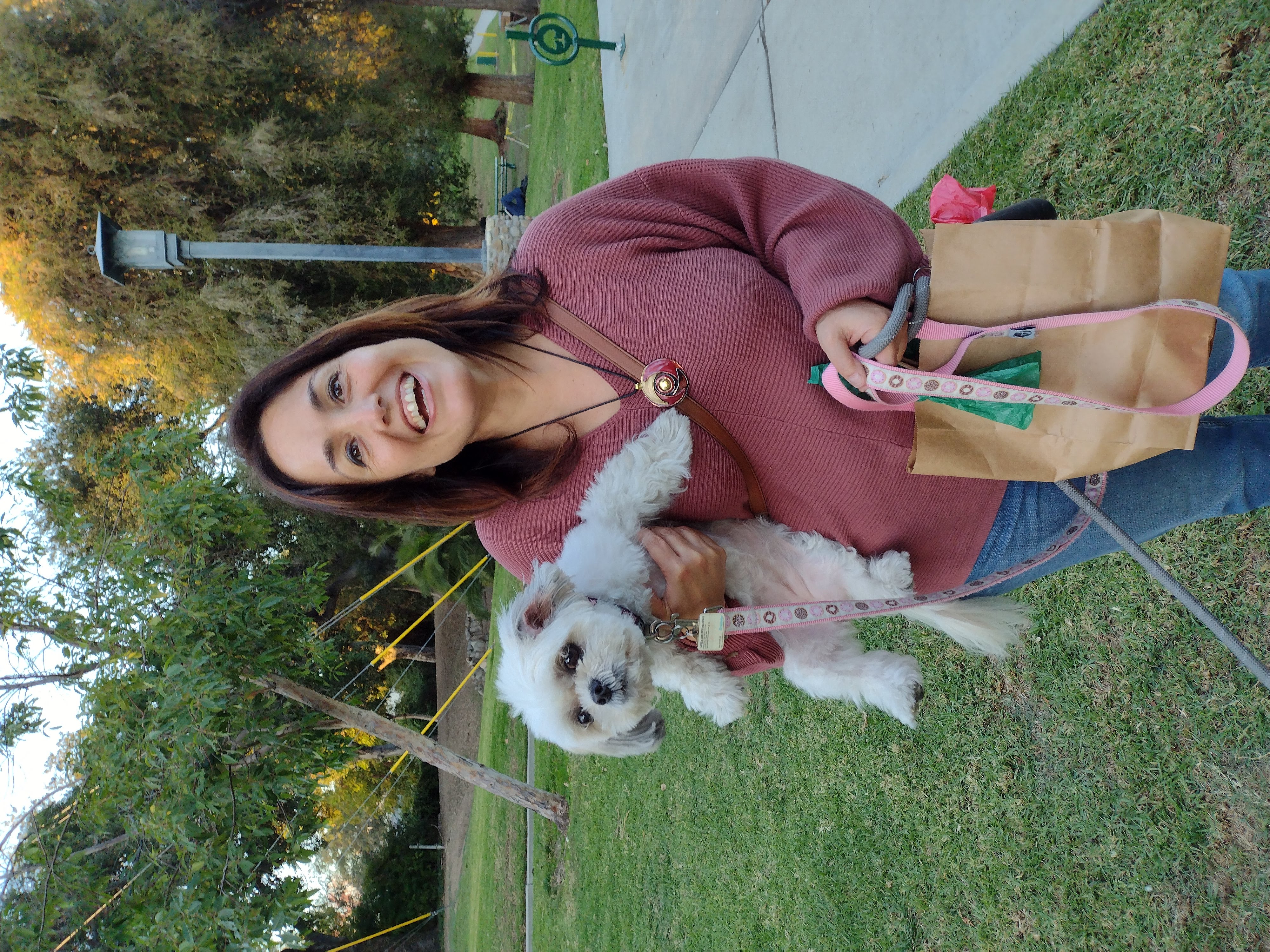 Laura with a small white dog